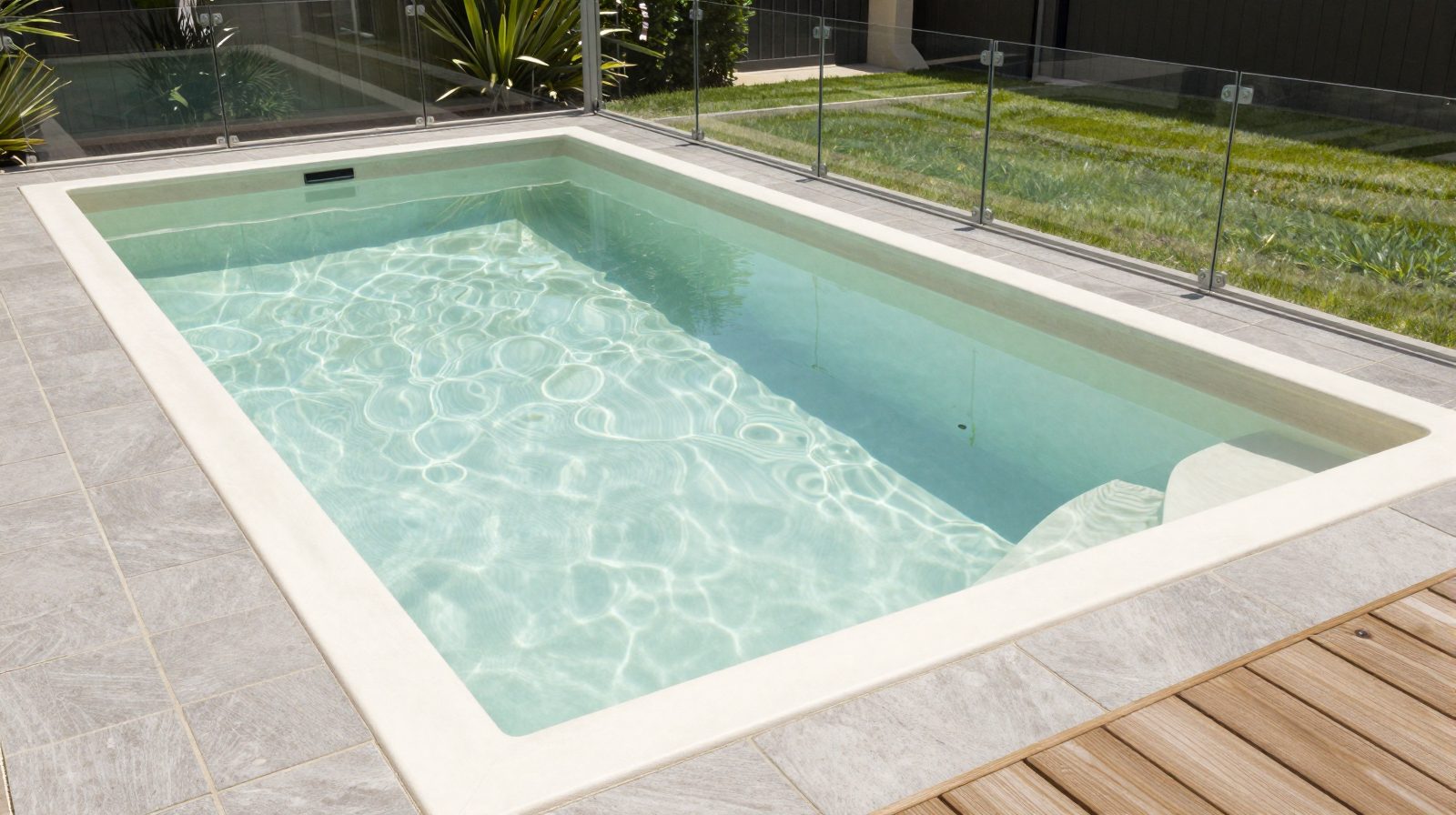 A backyard pool: cloudy